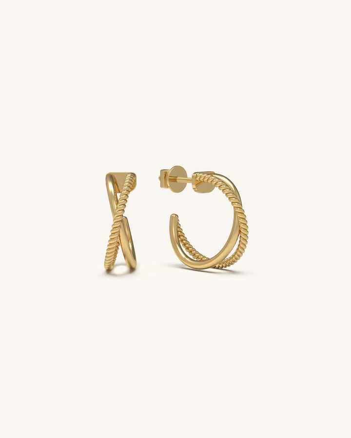 Pair of Braided Brilliance Hoops earrings in 18KT gold vermeil on 925 sterling silver with an open crossover design.