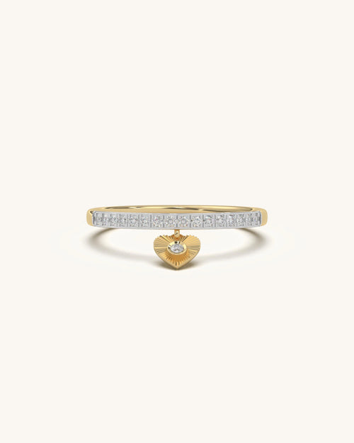 Gold heart ring design with diamond band and moving heart charm