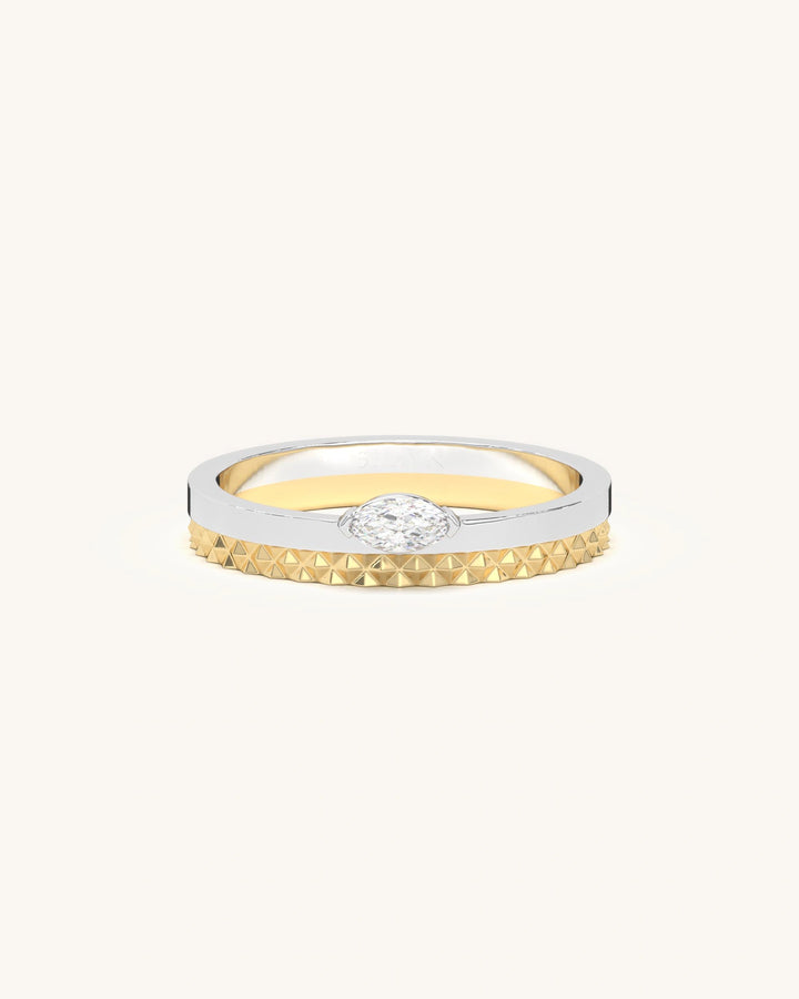 Petite Marquis Glint Band crafted from 925 sterling silver with an 18KT gold vermeil finish, featuring a brilliant marquise-cut moissanite diamond.