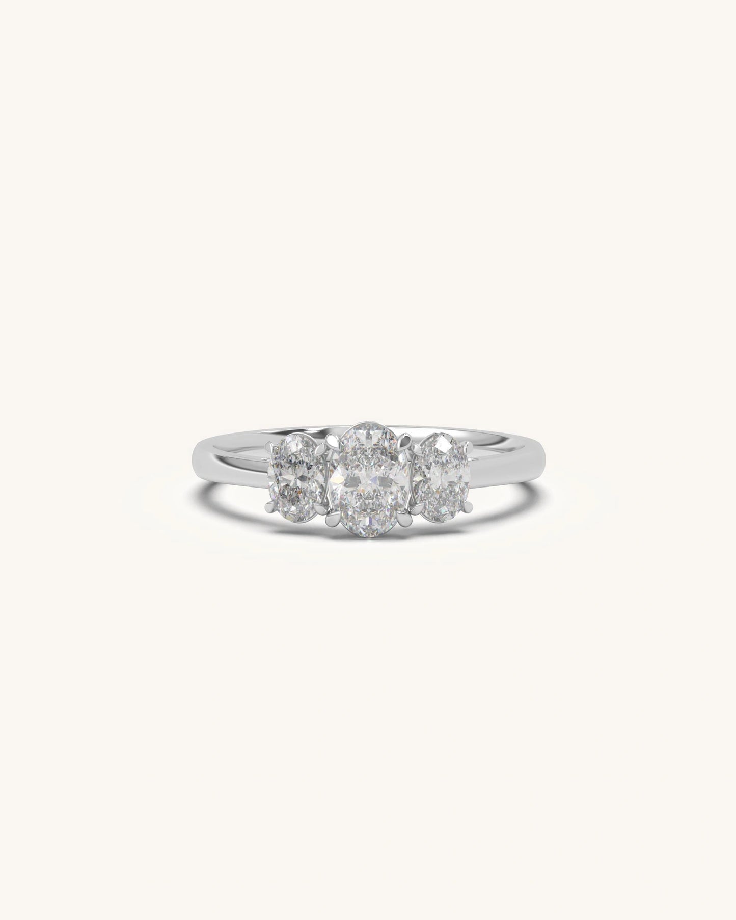 Oval trio diamond ring with elegant three stone setting