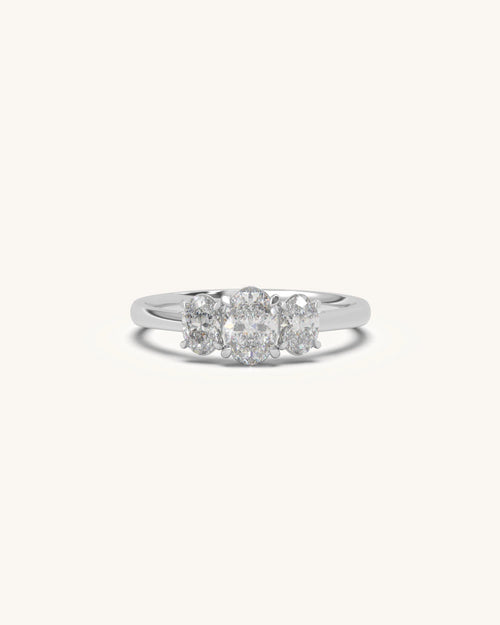Oval trio diamond ring with elegant three stone setting