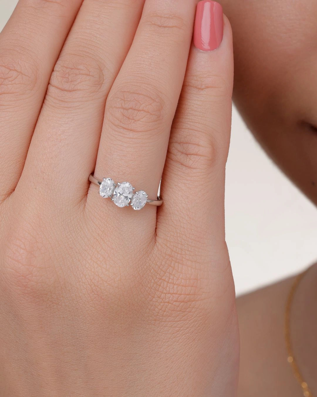Oval Trio Solitaire Ring