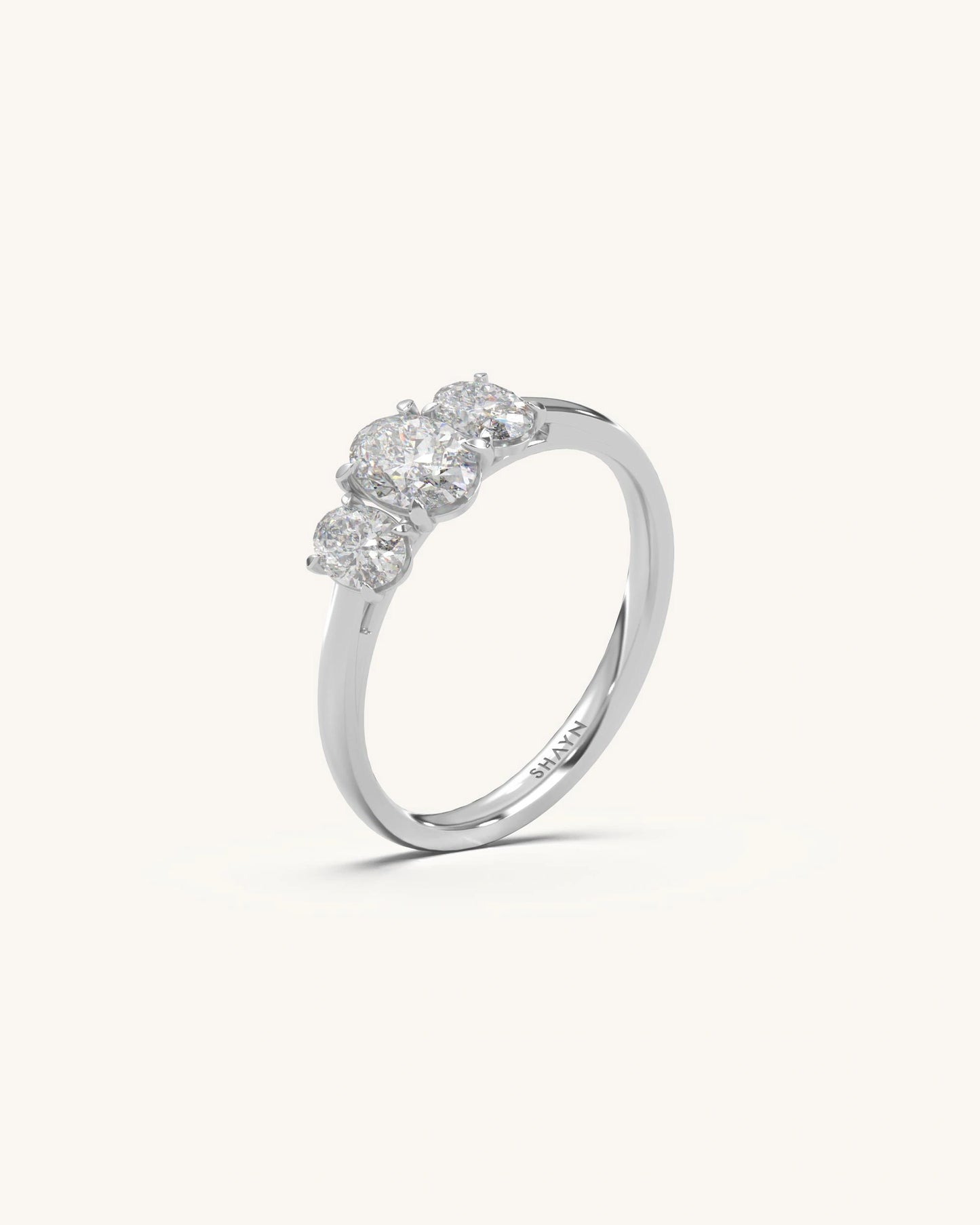 Oval Trio Solitaire Ring