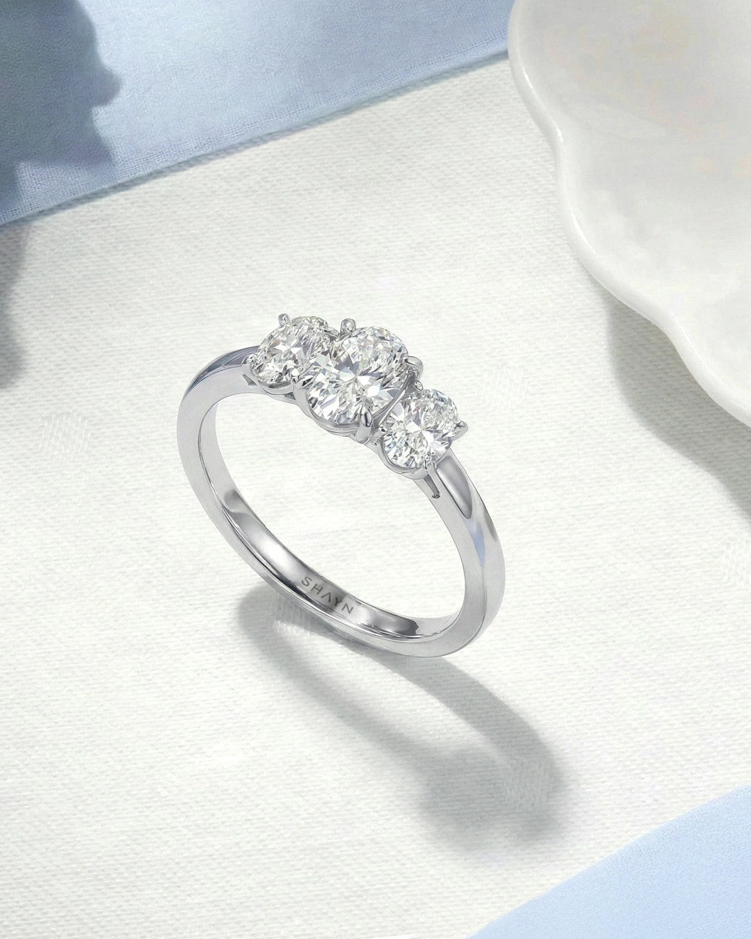 Oval Trio Solitaire Ring