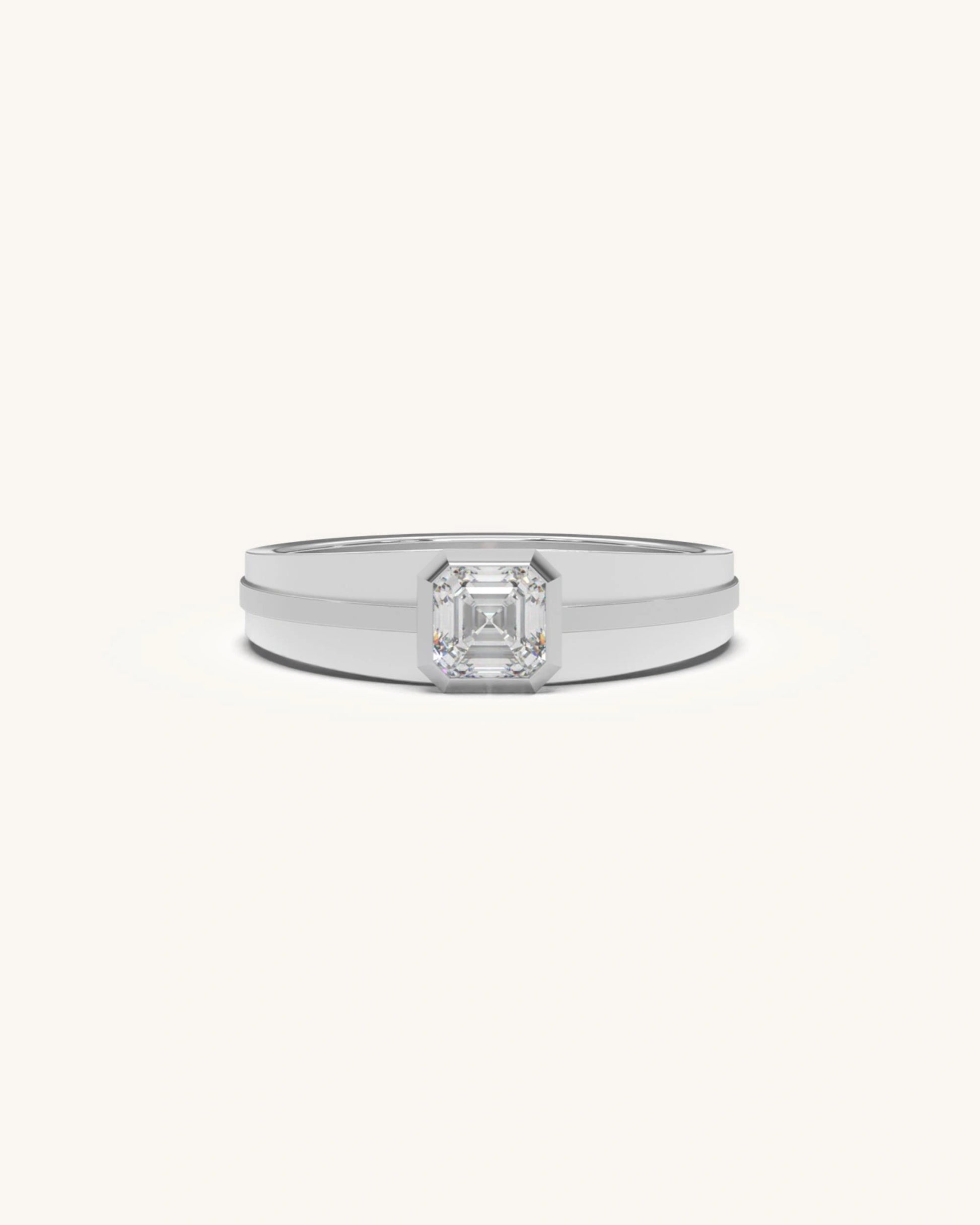 Solitaire diamond ring with radiant-cut bezel setting in sterling silver