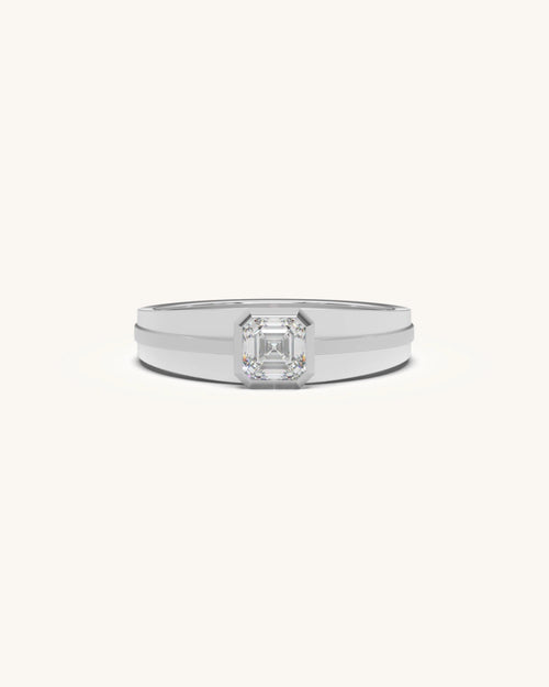 Solitaire diamond ring with radiant-cut bezel setting in sterling silver