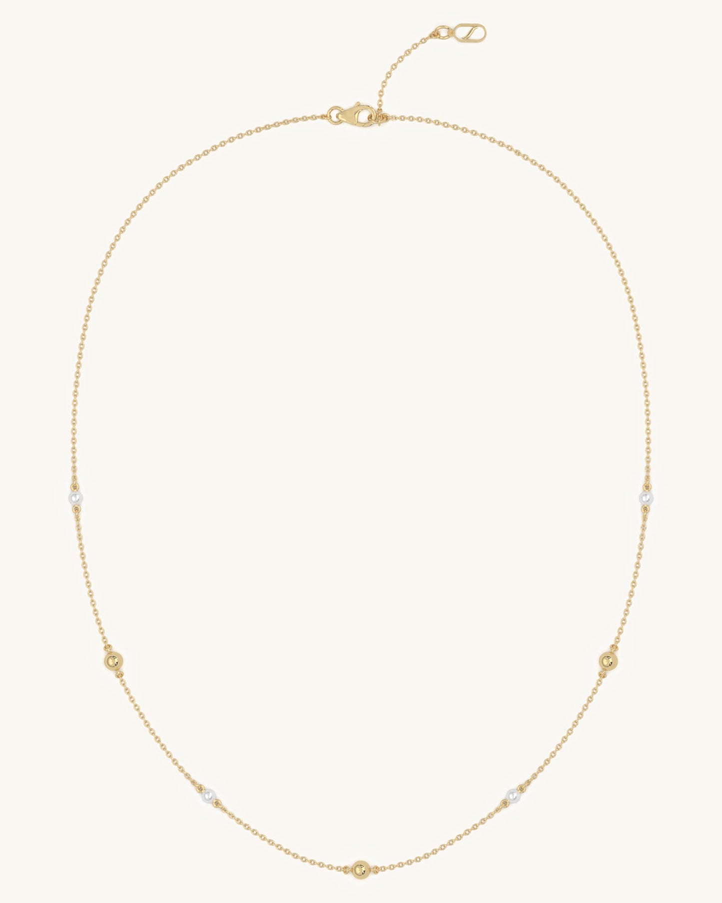 long pearl necklace.