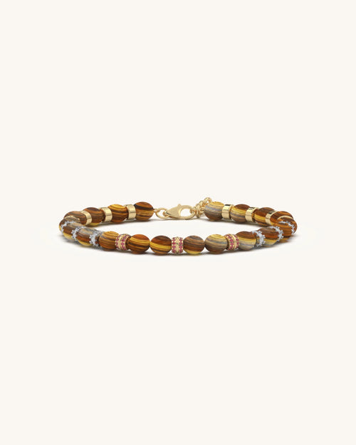 Tiger eye bracelet with ruby gemstone dividers and sturdy clasp