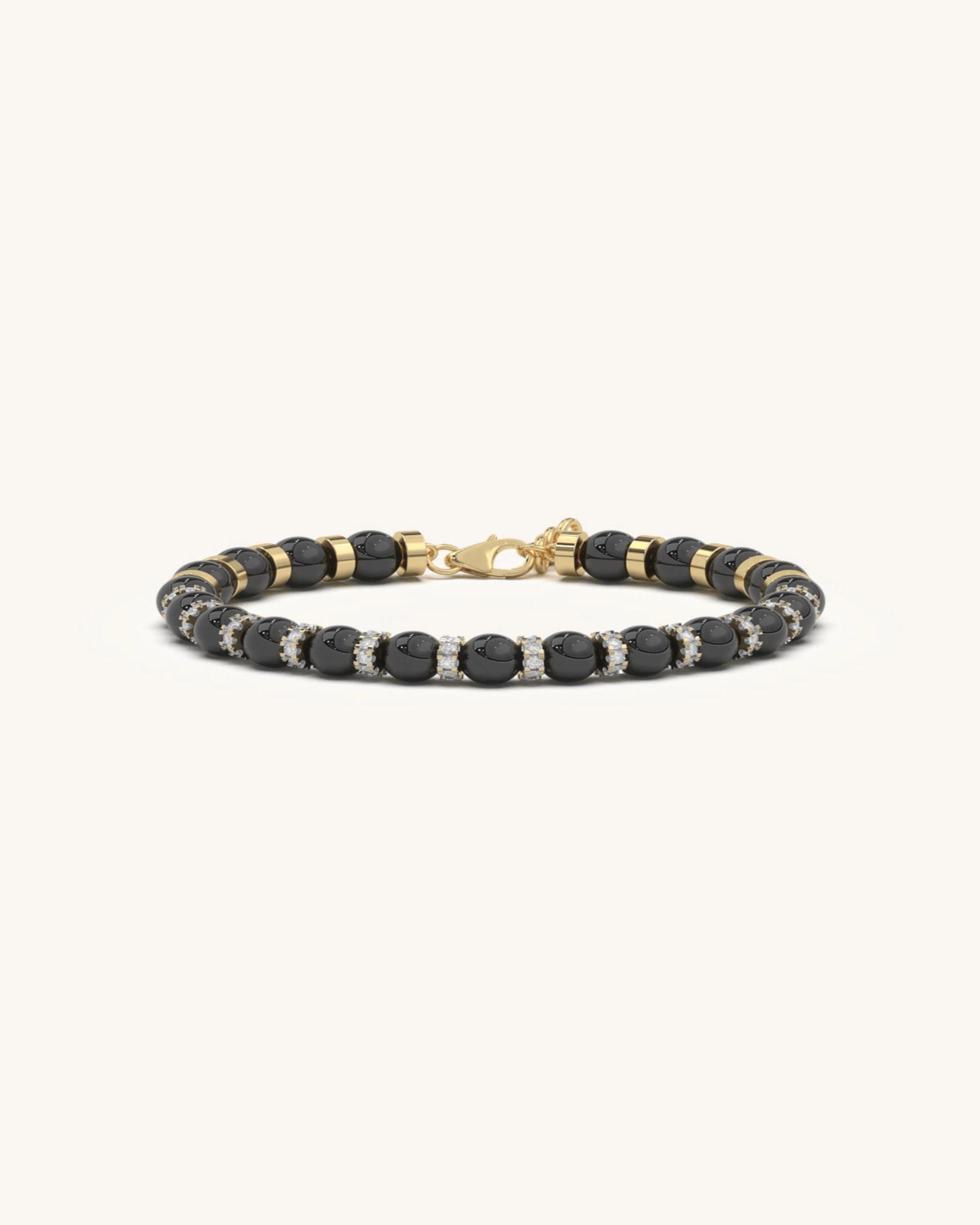 Mens black bracelet with black onyx beads and gold pavé spacers
