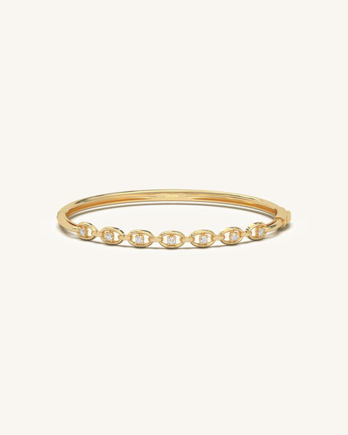 Gold diamond bracelet with oval links and moissanite sparkle in 18KT gold vermeil