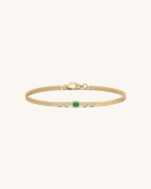 Gold bracelet for women with green stone and diamond accents