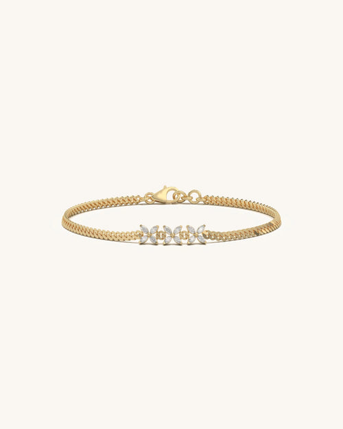 Diamond tennis bracelet with butterfly diamond motifs and continuous sparkle