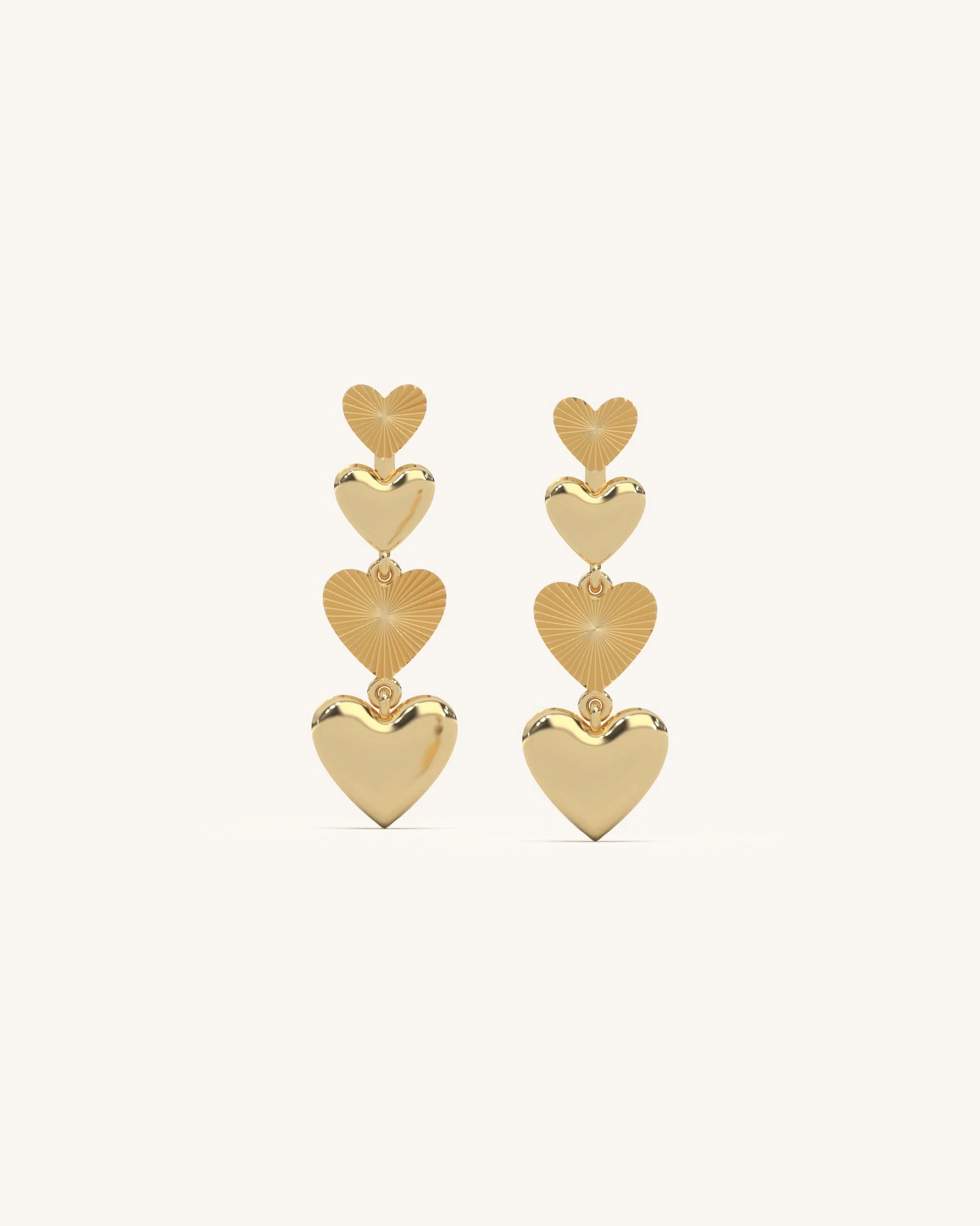Enchanting Heart Dangler Earrings with triple hearts in 18K Gold Vermeil
