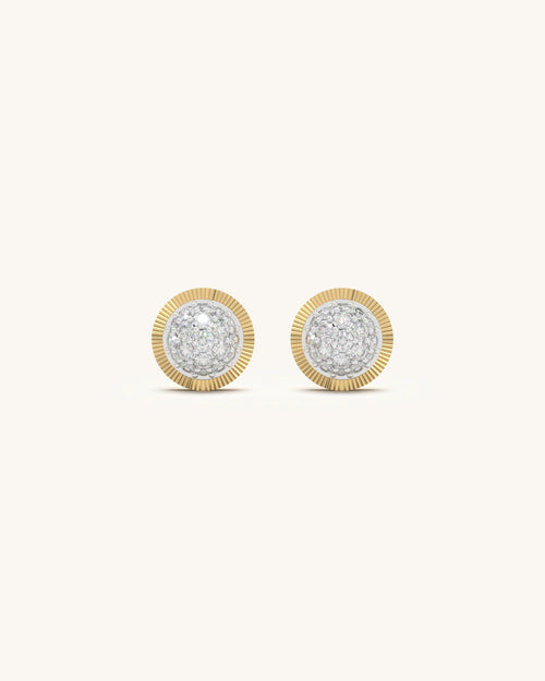 Close-up of Radiant Moissanite Stud Earrings in 18KT Gold Vermeil Sterling Silver with a sunburst design.