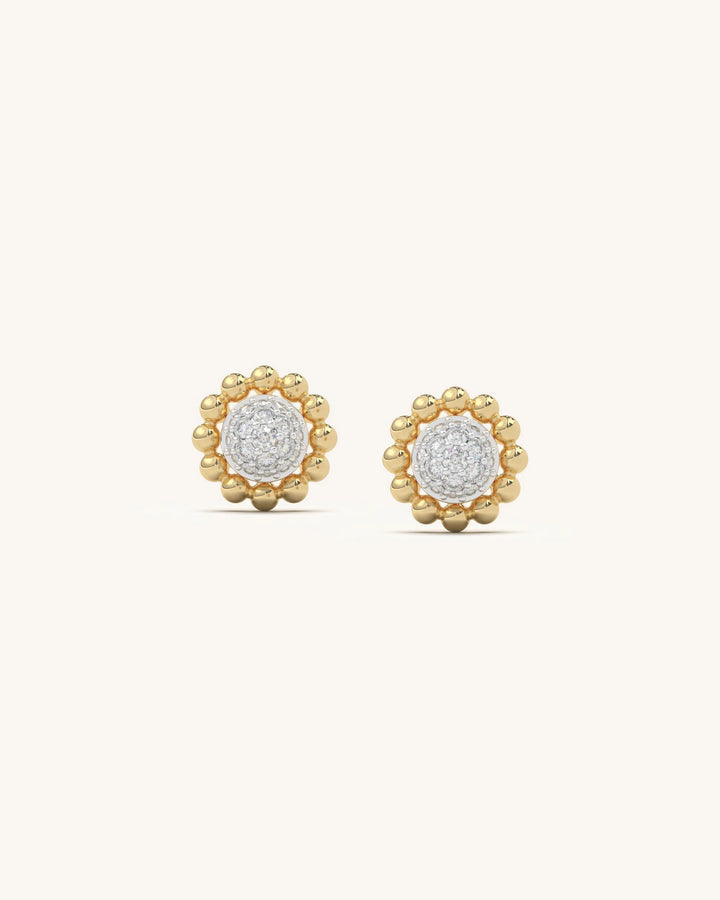 Close-up of Beaded Moissanite Stud Earrings in 18KT Gold Vermeil Sterling Silver with fine golden beads.