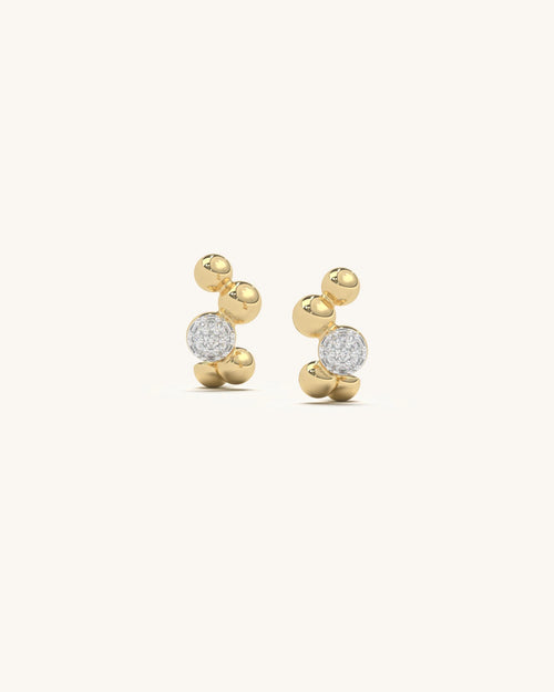 Elegant pearl cluster stud earrings in 18KT gold vermeil with moissanite accents, featuring an organic design on a white background