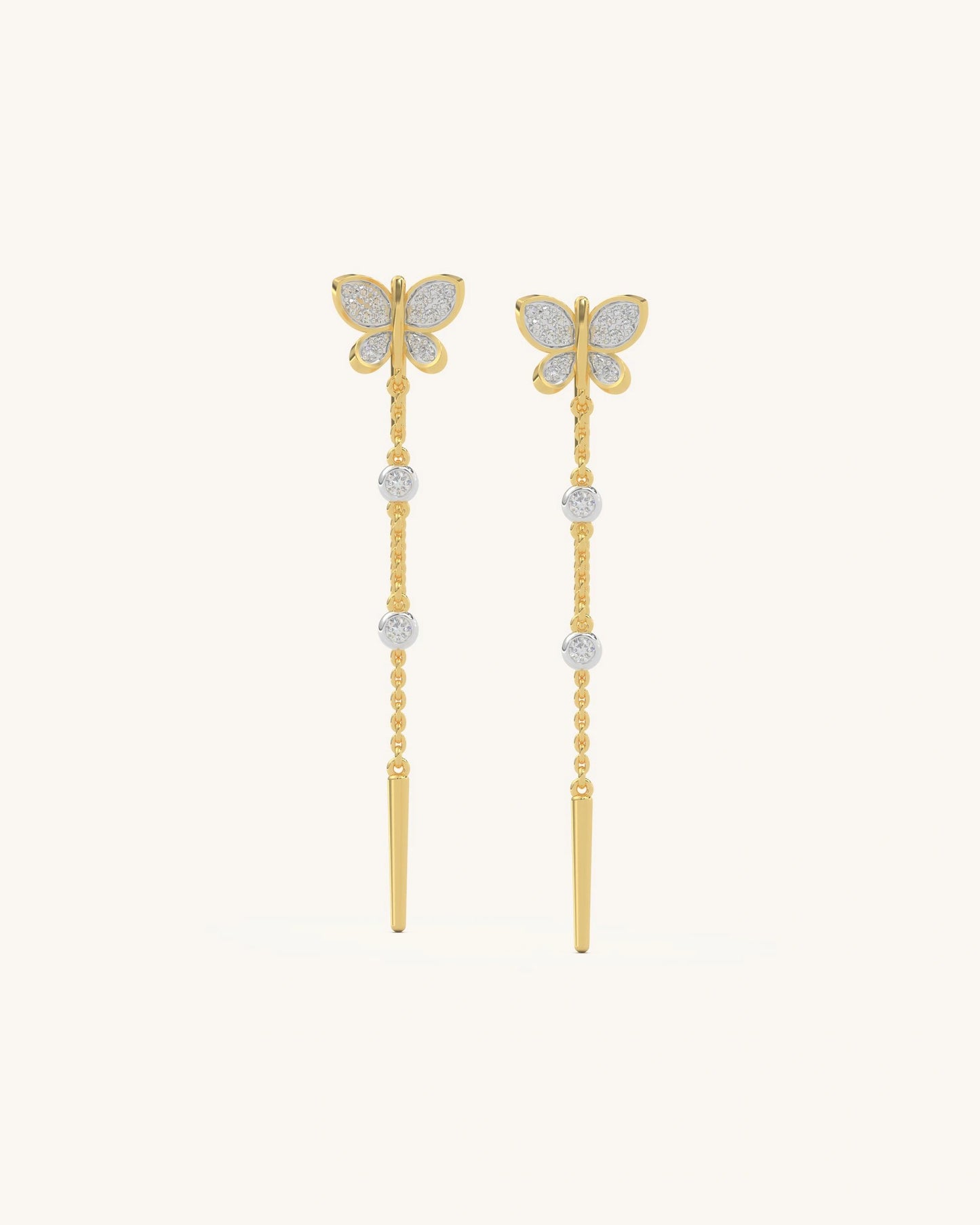 Gold vermeil butterfly chain drop earrings with delicate moissanite stones on a long vertical chain.