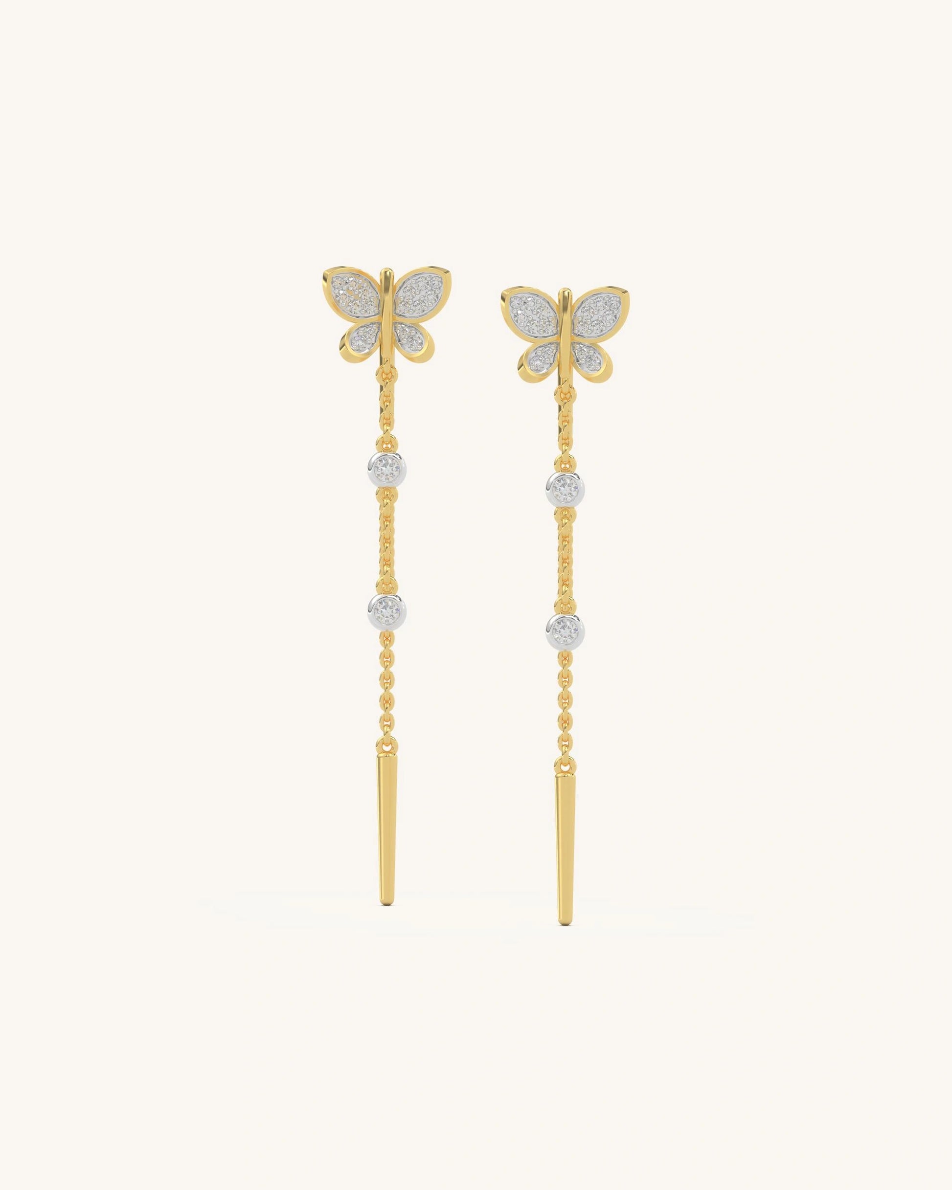 Gold vermeil butterfly chain drop earrings with delicate moissanite stones on a long vertical chain.