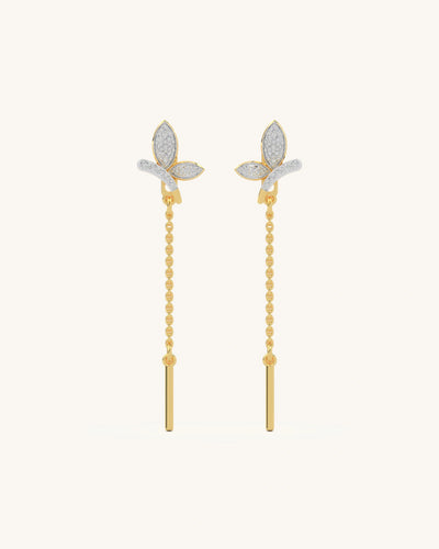 A pair of elegant long leaf earrings with three moissanite-filled wings, crafted in 18K gold vermeil and 925 sterling silver.