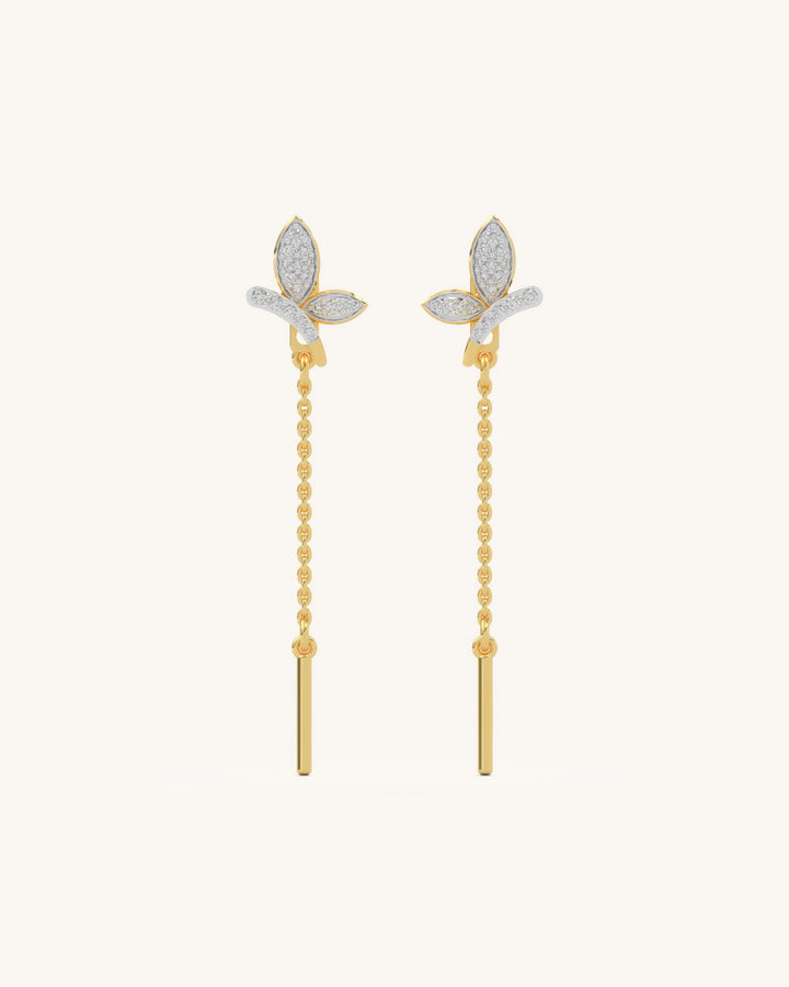 A pair of elegant long leaf earrings with three moissanite-filled wings, crafted in 18K gold vermeil and 925 sterling silver.