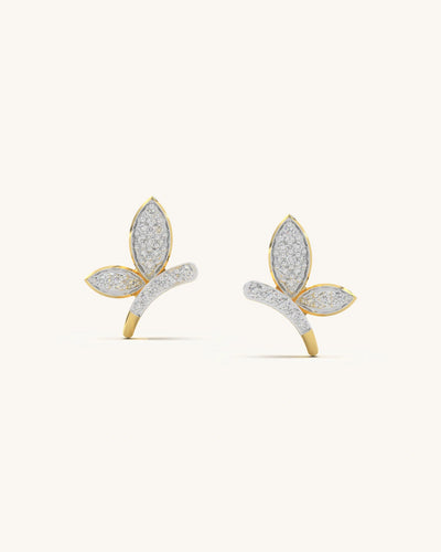 Close-up of Leaf Cluster Earrings in 18K Gold Vermeil with sparkling moissanite diamonds