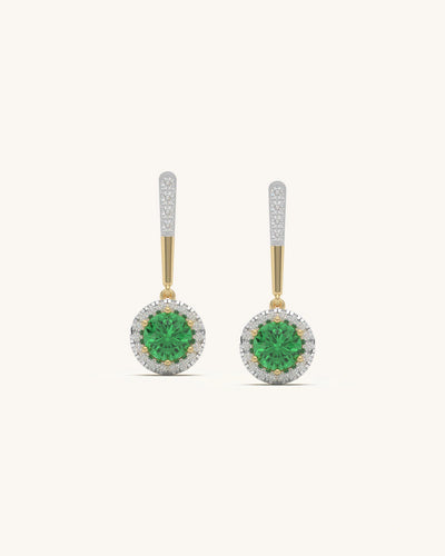 Halo Green Drop earrings featuring brilliant green center stones surrounded by moissanite halos, set in 18KT Gold Vermeil and 925 Sterling Silver.