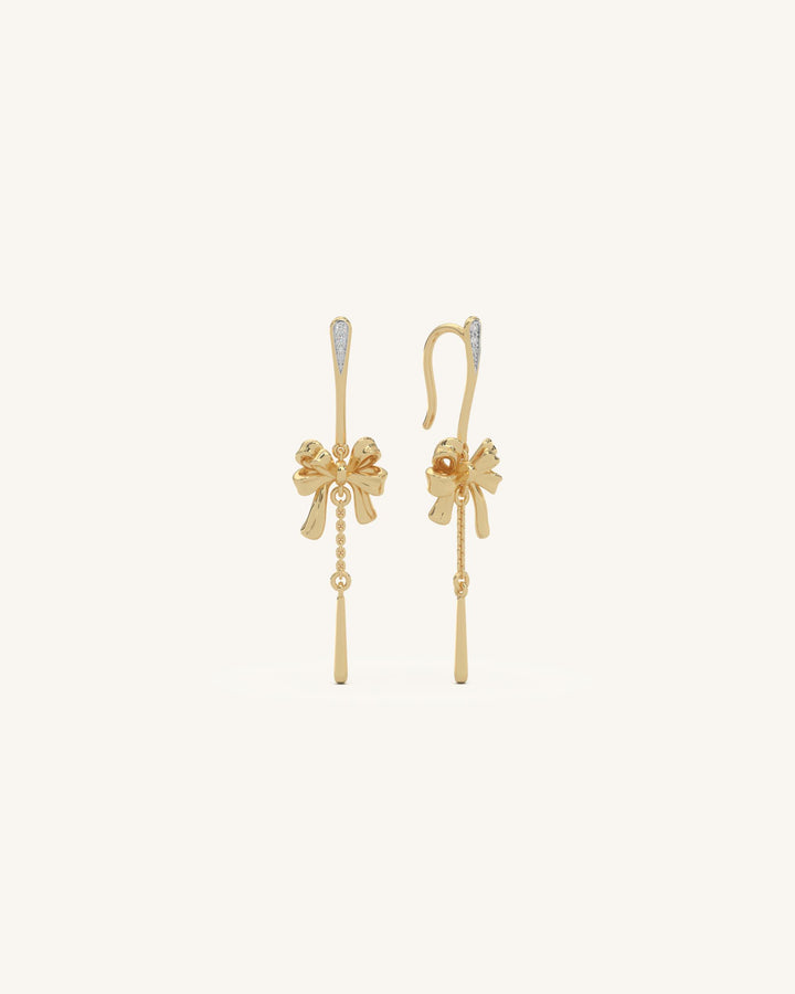 Elegant ribbon chain earrings with a dual-tone 18KT gold vermeil and 925 sterling silver top, featuring a cascading chain of gold dots and sparkling moissanite.