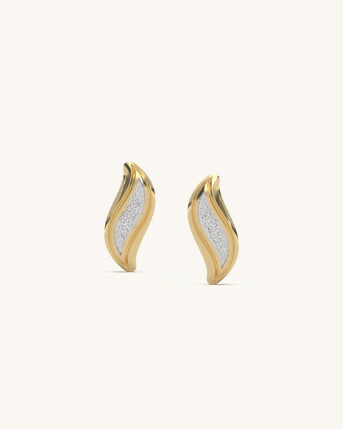 Close-up of Wave Motif Earrings in 18KT Gold Vermeil with moissanite diamonds, showcasing their unique wavy design and high polish finish on an earlobe.