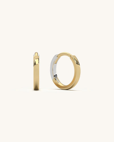 Minimalist 18KT gold vermeil simple hoop earrings on a white background,