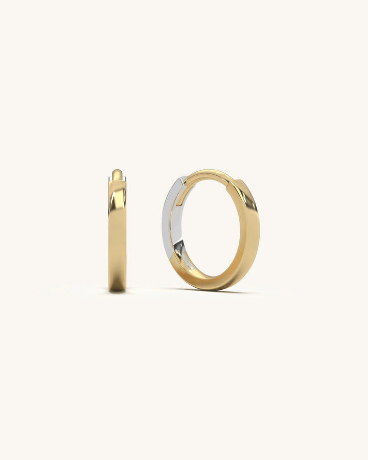 Minimalist 18KT gold vermeil simple hoop earrings on a white background,