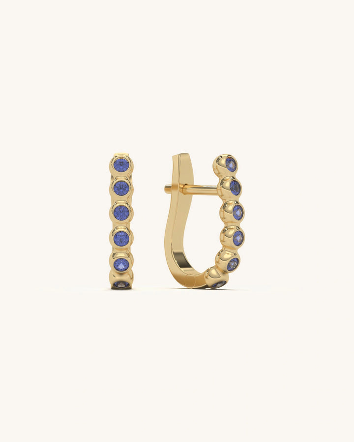 Pair of blue stone hoop earrings in 18KT gold vermeil and 925 sterling silver, with secure clasp