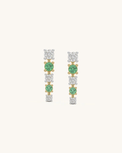 Elegant green and white line dangle earrings in 18K gold vermeil silver with moissanite and green stones.