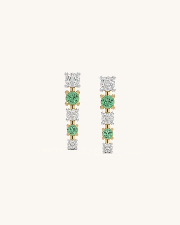 Elegant green and white line dangle earrings in 18K gold vermeil silver with moissanite and green stones.