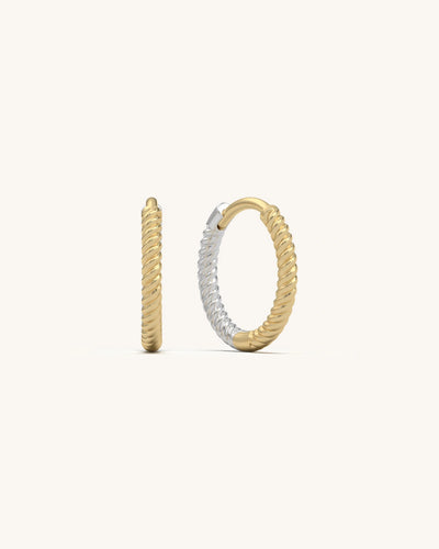 Pair of Rope Twist Huggies earrings in 18K Gold Vermeil and 925 Sterling Silver, showcasing their twisted texture