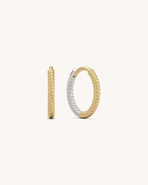 Pair of Rope Twist Huggies earrings in 18K Gold Vermeil and 925 Sterling Silver, showcasing their twisted texture