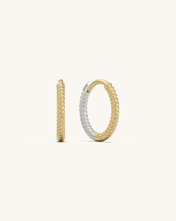 Pair of Rope Twist Huggies earrings in 18K Gold Vermeil and 925 Sterling Silver, showcasing their twisted texture