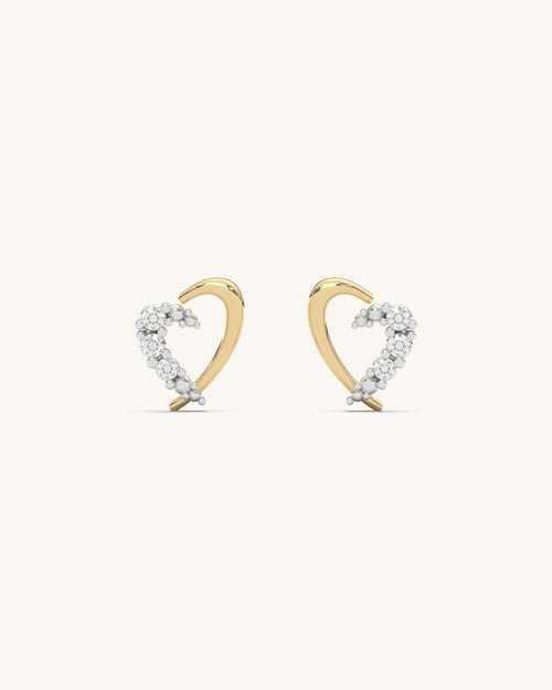 Close-up of SHAYN Curved Heart Studs in 18K Gold Vermeil with Moissanite stones on 925 Sterling Silver