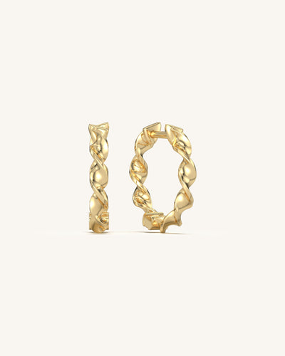 Sculptural wavy hoop earrings in 18K gold vermeil 925 sterling silver for women.