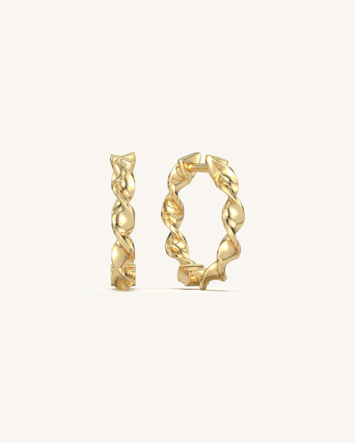 Sculptural wavy hoop earrings in 18K gold vermeil 925 sterling silver for women.