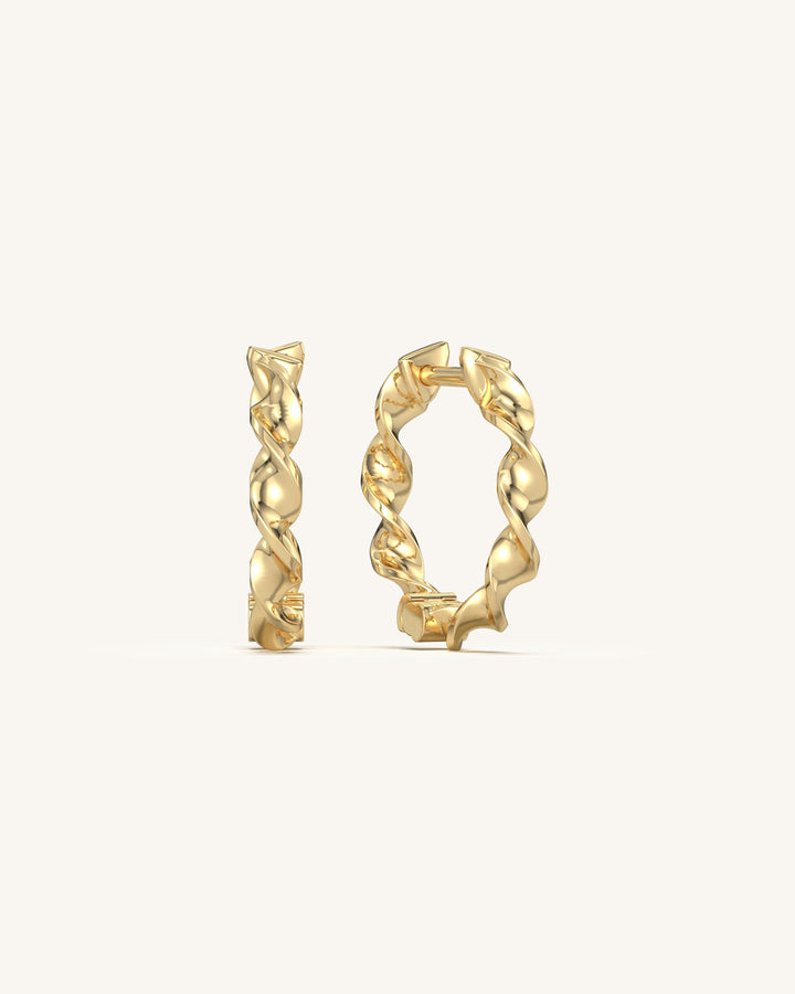 Sculptural wavy hoop earrings in 18K gold vermeil 925 sterling silver for women.