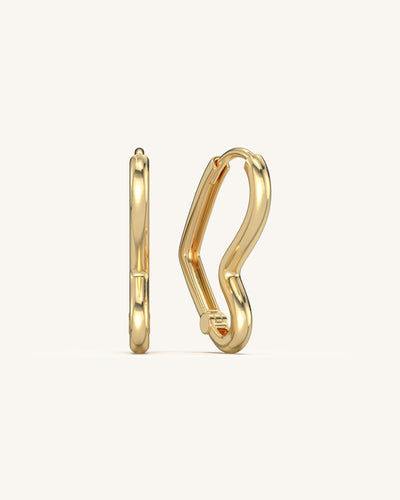 Pair of SHAYN Angular Heart Hoops in 18K Gold Vermeil on 925 Sterling Silver, showcasing their unique prismatic design