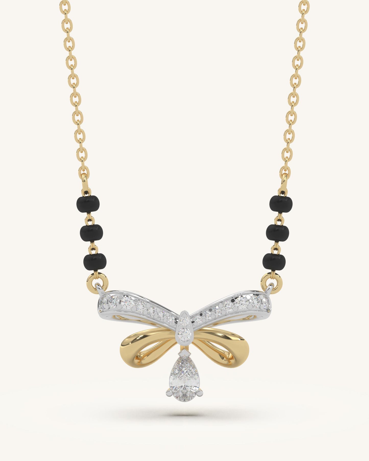 Mangalsutra Bow Necklace & Twist Huggie Earrings