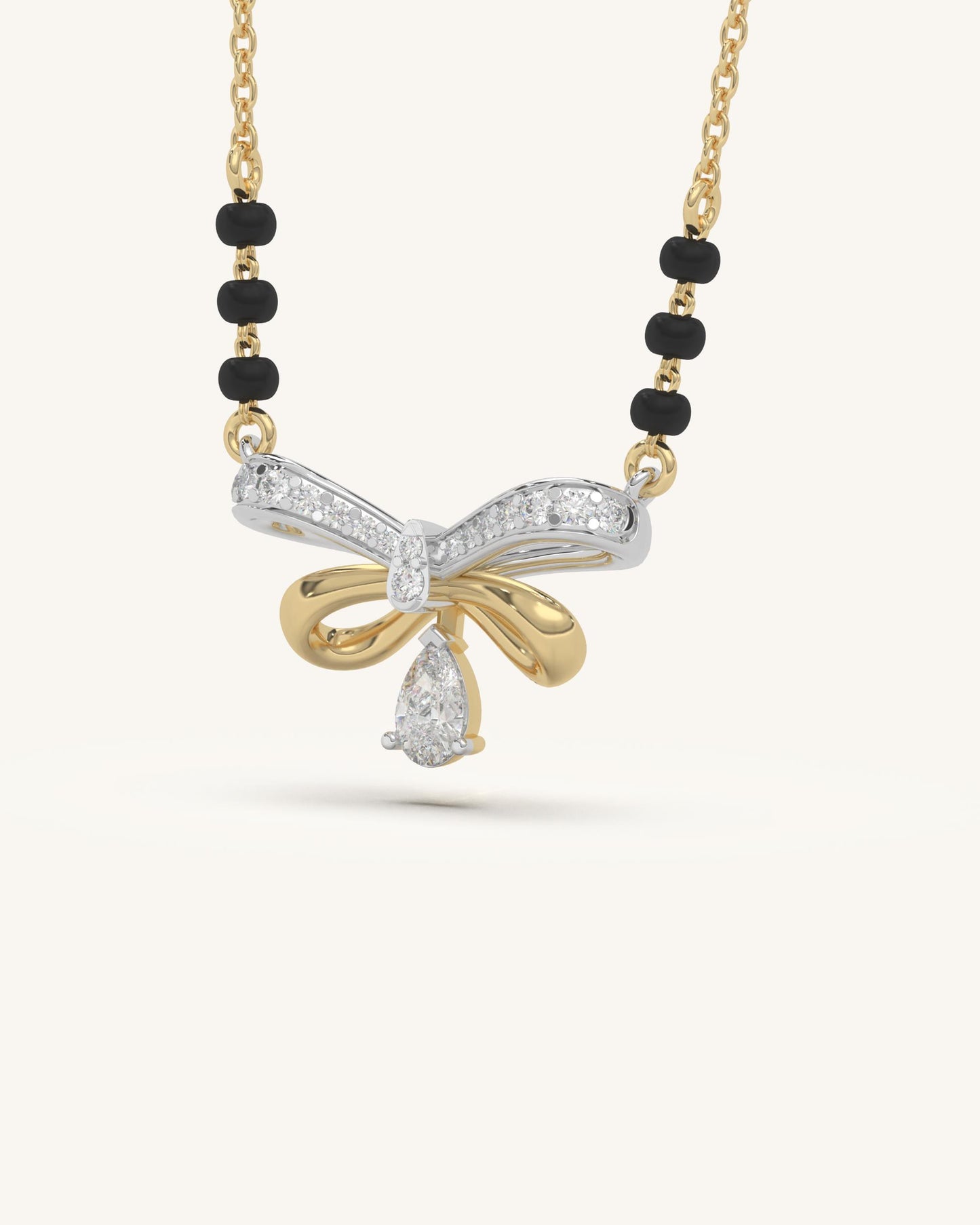 Mangalsutra Bow Necklace & Twist Huggie Earrings